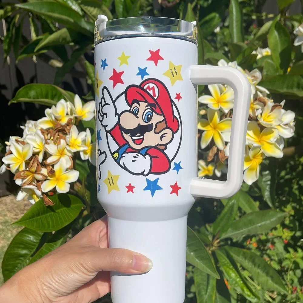 Nintendo Super Mario Bros Tumbler 40 oz umbler with hand carry handle. Brand New